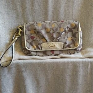 Coach Signature gold leather trim wristlet